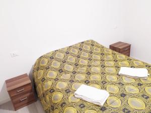 Posteľ alebo postele v izbe v ubytovaní Levico Al Corso Apartments