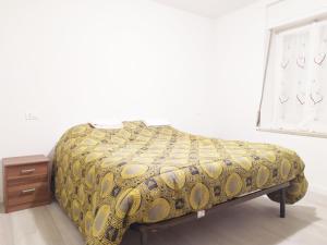 Posteľ alebo postele v izbe v ubytovaní Levico Al Corso Apartments