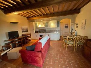 A kitchen or kitchenette at Appartement - Le corti di Orciatico