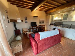 A seating area at Appartement - Le corti di Orciatico