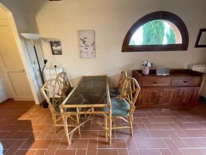 A seating area at Appartement - Le corti di Orciatico