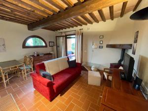 A seating area at Appartement - Le corti di Orciatico