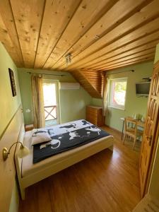 Un pat sau paturi într-o cameră la Mariu Krantas