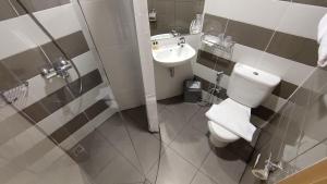 Koupelna v ubytování Agogo Downtown Hotel Surabaya