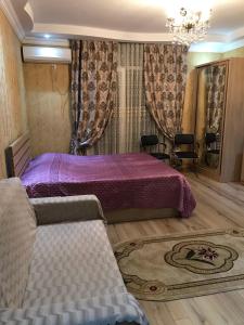 Postel nebo postele na pokoji v ubytování Orbi Towers Batumi