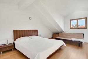 Кровать или кровати в номере Vila Adriana