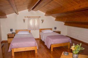 A bed or beds in a room at Villa Erofili Plakias south Rethimno Crete