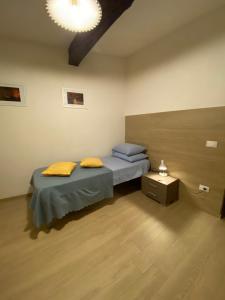 Ένα ή περισσότερα κρεβάτια σε δωμάτιο στο Acqua d'orcio