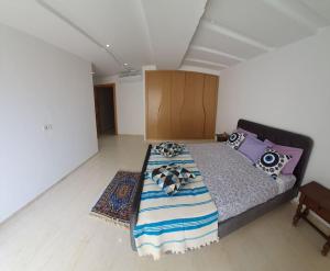 Postel nebo postele na pokoji v ubytování Appartement Corniche en bord de mer