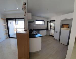 Kuchyň nebo kuchyňský kout v ubytování Appartement Corniche en bord de mer