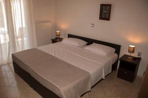 A bed or beds in a room at Villa Erofili Plakias south Rethimno Crete