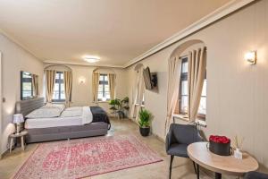 Postel nebo postele na pokoji v ubytování Cosel Palais Appartement