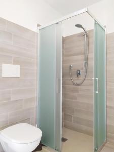 Kúpeľňa v ubytovaní Levico Al Corso Apartments