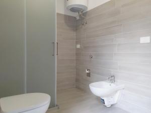 Kúpeľňa v ubytovaní Levico Al Corso Apartments