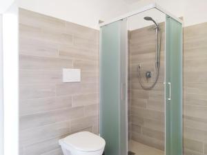 Kúpeľňa v ubytovaní Levico Al Corso Apartments
