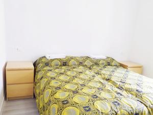 Ένα ή περισσότερα κρεβάτια σε δωμάτιο στο Levico Al Corso Apartments