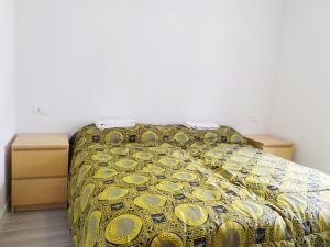 Posteľ alebo postele v izbe v ubytovaní Levico Al Corso Apartments