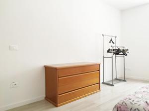 Posteľ alebo postele v izbe v ubytovaní Levico Al Corso Apartments