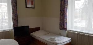 Postel nebo postele na pokoji v ubytování THE Z ACCOMMODATION
