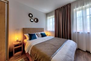 Un pat sau paturi într-o cameră la Villa Gunga