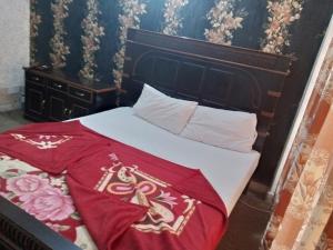 Postel nebo postele na pokoji v ubytování HOTEL DE GRAND