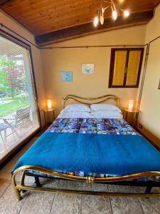 A bed or beds in a room at Residence delle Rose