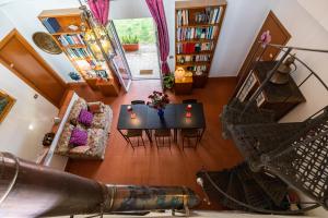 an overhead view of a living room with a table at La Tana delle Stelle B&B di Charme e Relax in Fara in Sabina