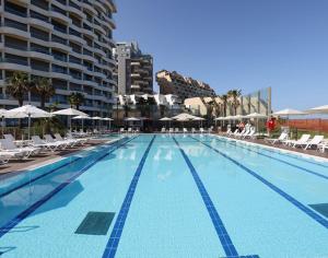 The swimming pool at or close to West Tel Aviv- All Suites Hotel By The Sea