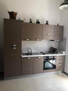 Kuchyň nebo kuchyňský kout v ubytování B&B Cinisi Mare e Monti