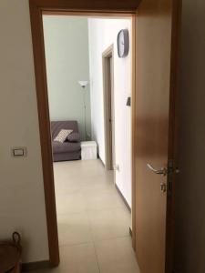 Postel nebo postele na pokoji v ubytování B&B Cinisi Mare e Monti