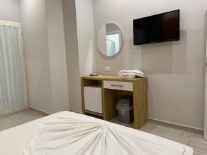 TV a/nebo společenská místnost v ubytování Hotel Beler