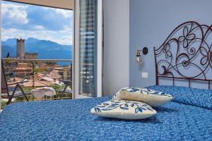 Postel nebo postele na pokoji v ubytování Eco Hotel Ariston + 37 fotografií