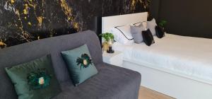 Posteľ alebo postele v izbe v ubytovaní TokiTakai Collection