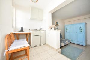 Kuchyň nebo kuchyňský kout v ubytování Apartment Plazza Rafailovici