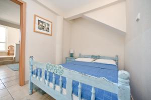 Postel nebo postele na pokoji v ubytování Apartment Plazza Rafailovici