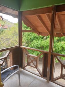 Μπαλκόνι ή βεράντα στο Seawind Cottage Authentic St.Lucian Accommodation near Plantation Beach