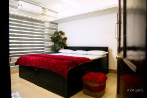 Posteľ alebo postele v izbe v ubytovaní ARABIAN HOLIDAY RESORT WITH SWIMMING POOL IN IDUKKI Calvary Mount