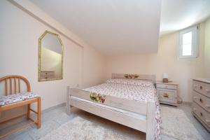 Postel nebo postele na pokoji v ubytování Apartment Plazza Rafailovici