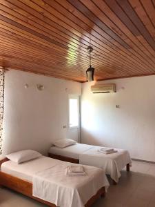 Postel nebo postele na pokoji v ubytování Cirali Irmak Hotel
