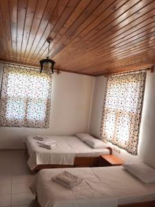 Postel nebo postele na pokoji v ubytování Cirali Irmak Hotel