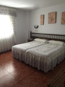 Postel nebo postele na pokoji v ubytování HOTEL O NOSO BAR