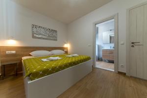 Posteľ alebo postele v izbe v ubytovaní Apartment MARE