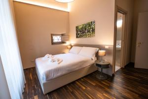 A bed or beds in a room at Il Pradicciolo Agriturismo