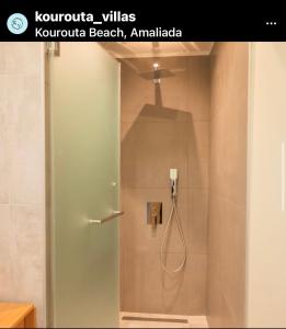 Koupelna v ubytování KOUROUTA VILLAS