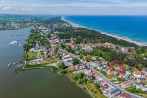 an aerial view of a town next to the water at Villa Mielno-EKO in Mielno