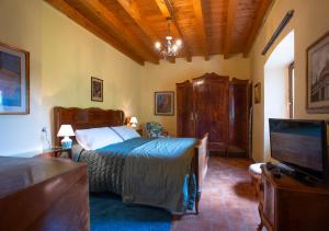 Posteľ alebo postele v izbe v ubytovaní La casa del bosco