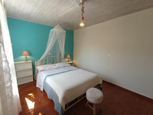 A bed or beds in a room at Sweet Maisonette in Corfu Town