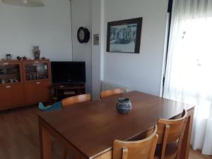A television and/or entertainment centre at Cantos do Coido