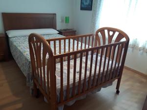 A bed or beds in a room at Cantos do Coido