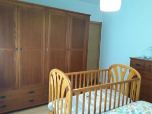 A bed or beds in a room at Cantos do Coido